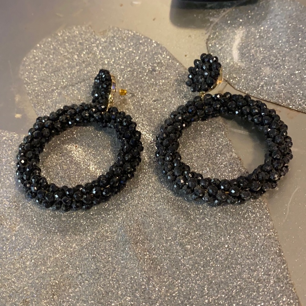 Black jeweled earrings